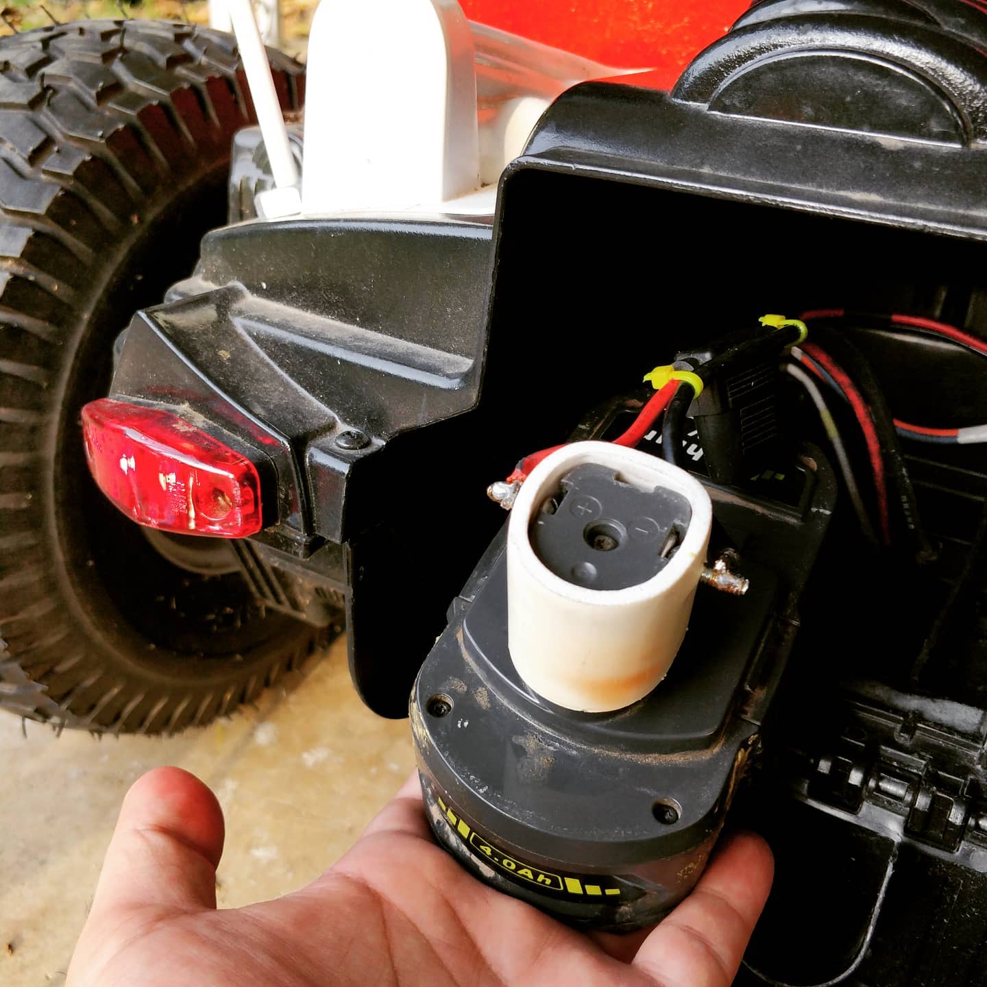 New battery terminal connector. Rear lights are illuminated