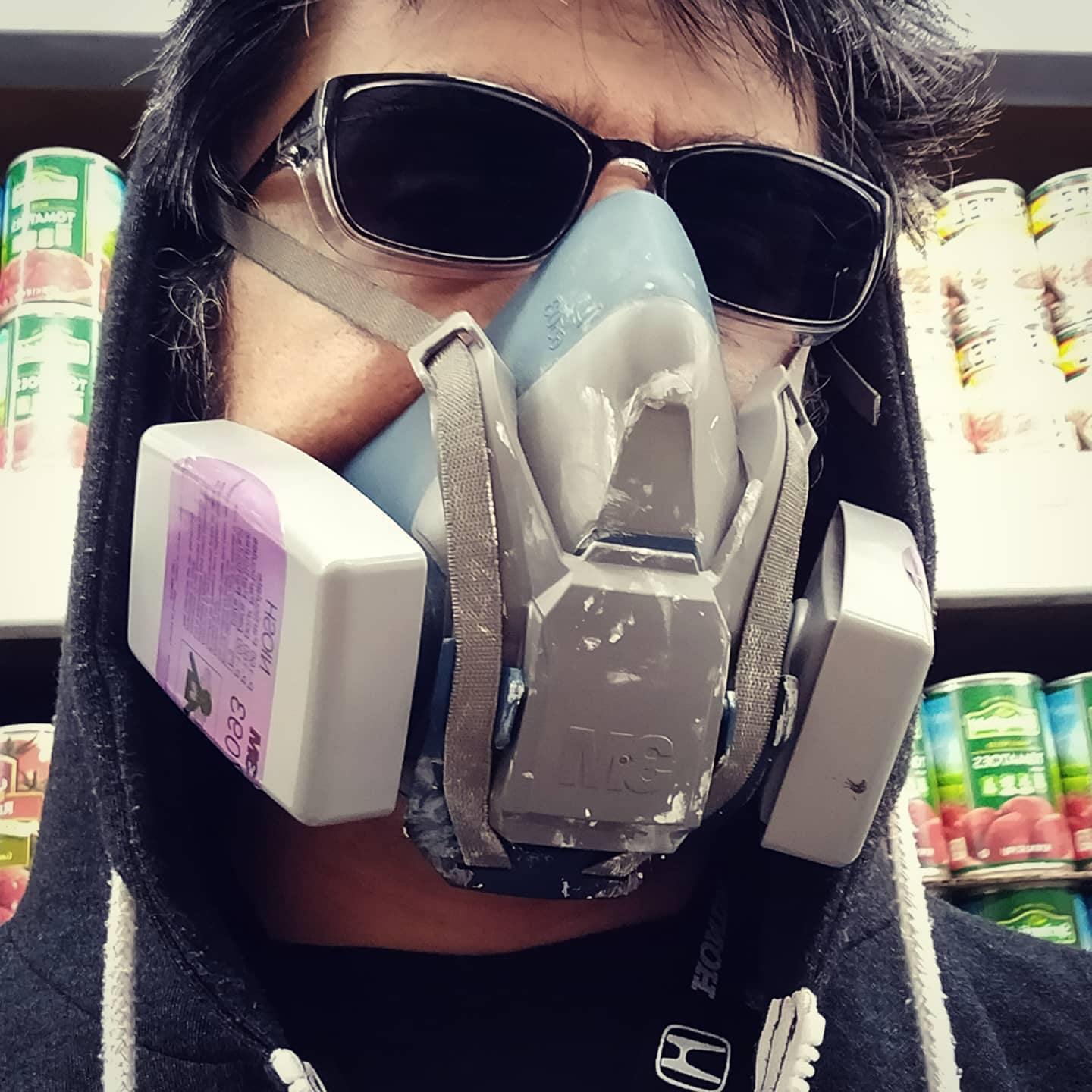 Grocery shopping in PPE. Ready for pandemic, riot control...