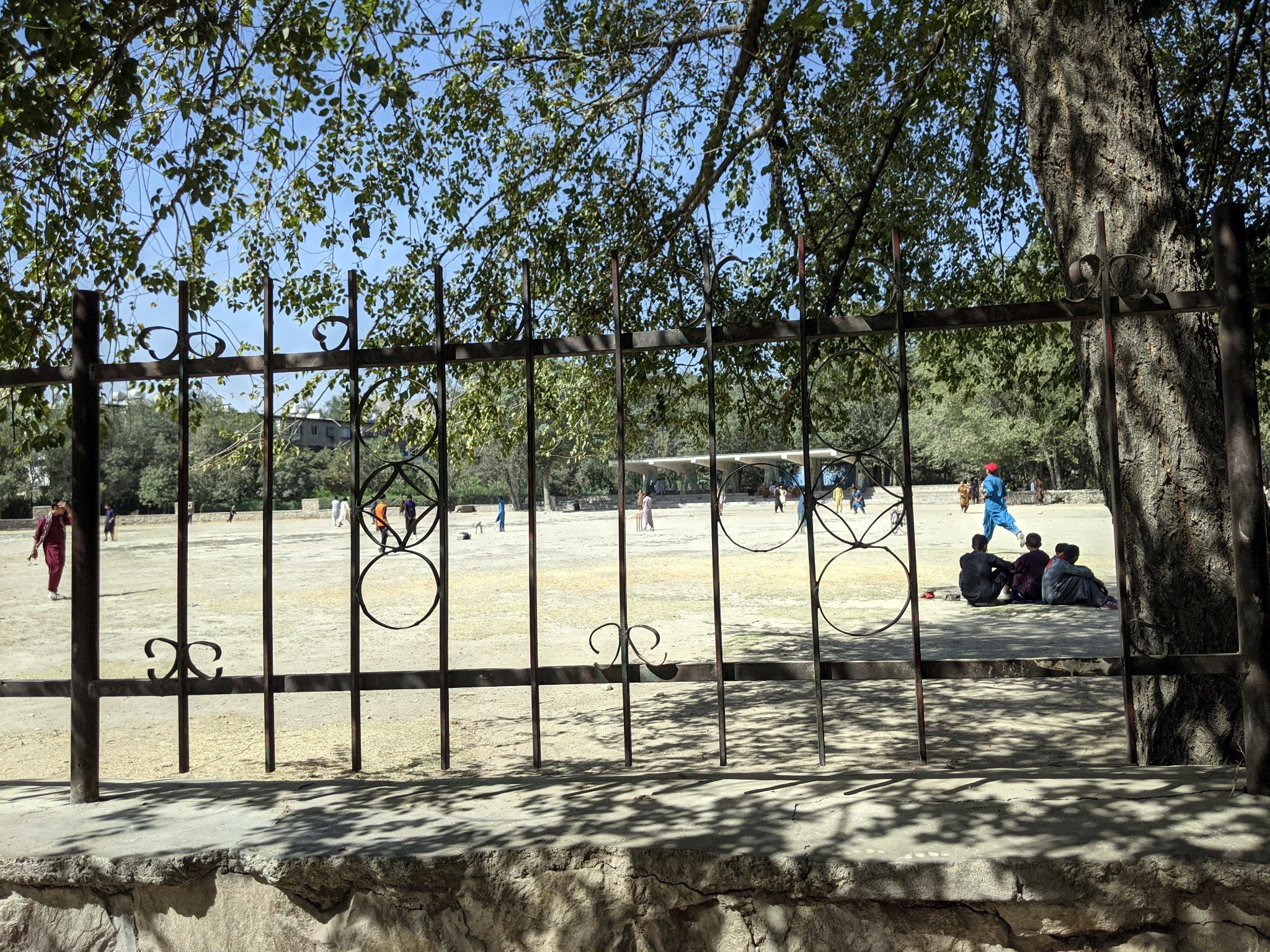 Boys playing cricket in Kabul