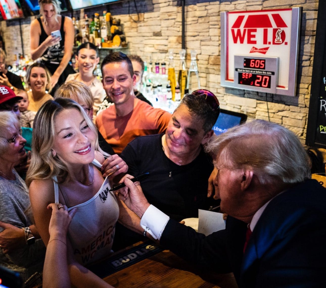 Trump signing autographs in Iowa