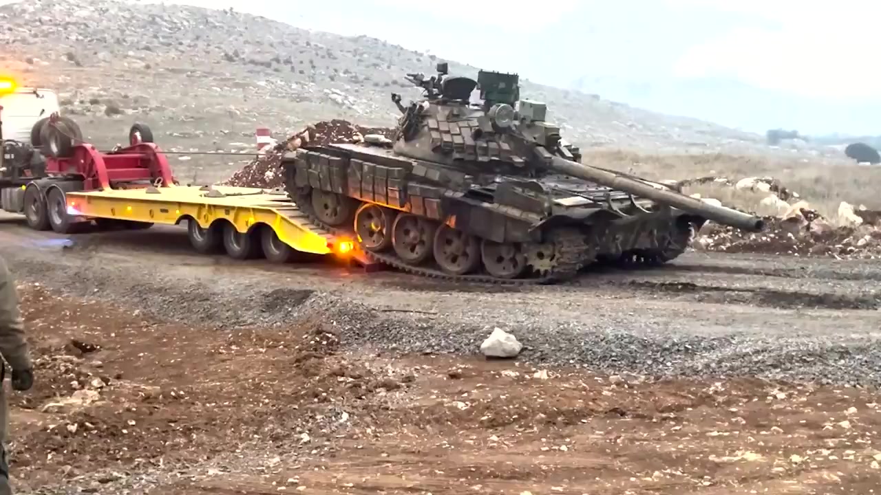 Israeli forces seize another one of Assad's SAA T-55...